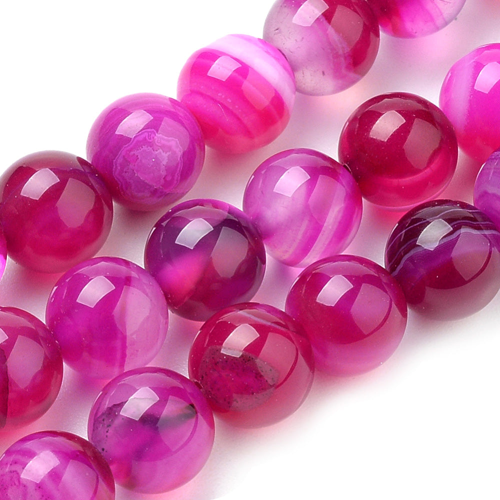 Fuchsia Striped Agate Beads, Round, Dyed, Pink Banded Agate. Semi-Precious Gemstone Beads for Jewelry Making. Great for Stretch Bracelets and Necklaces.  Size: 6mm Diameter, Hole: 1mm; approx. 62pcs/strand, 14.5" Inches Long.  Material: Striped Banded Agate Loose Beads Dyed Hot Pink Color. Polished, Shinny Finish.