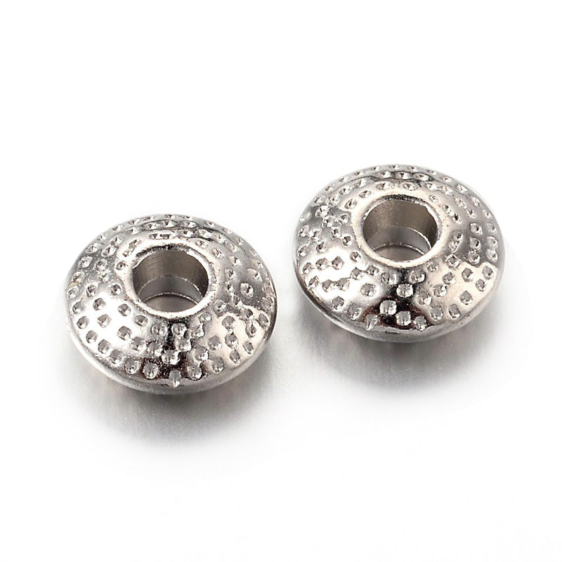 Tibetan Flat Round Spacer Beads, Platinum Silver Color. Silver Spacers for DIY Jewelry Making Projects. Disc Space Beads with Dot Design.   Size: 8mm Wide, 3mm Thick, Hole: 2.5mm, approx. 50pcs/bag.   Material:  Tibetan Style, Shinny Finish. Platinum Silver Color. Cadmium, Lead and Nickel Free Spacers.