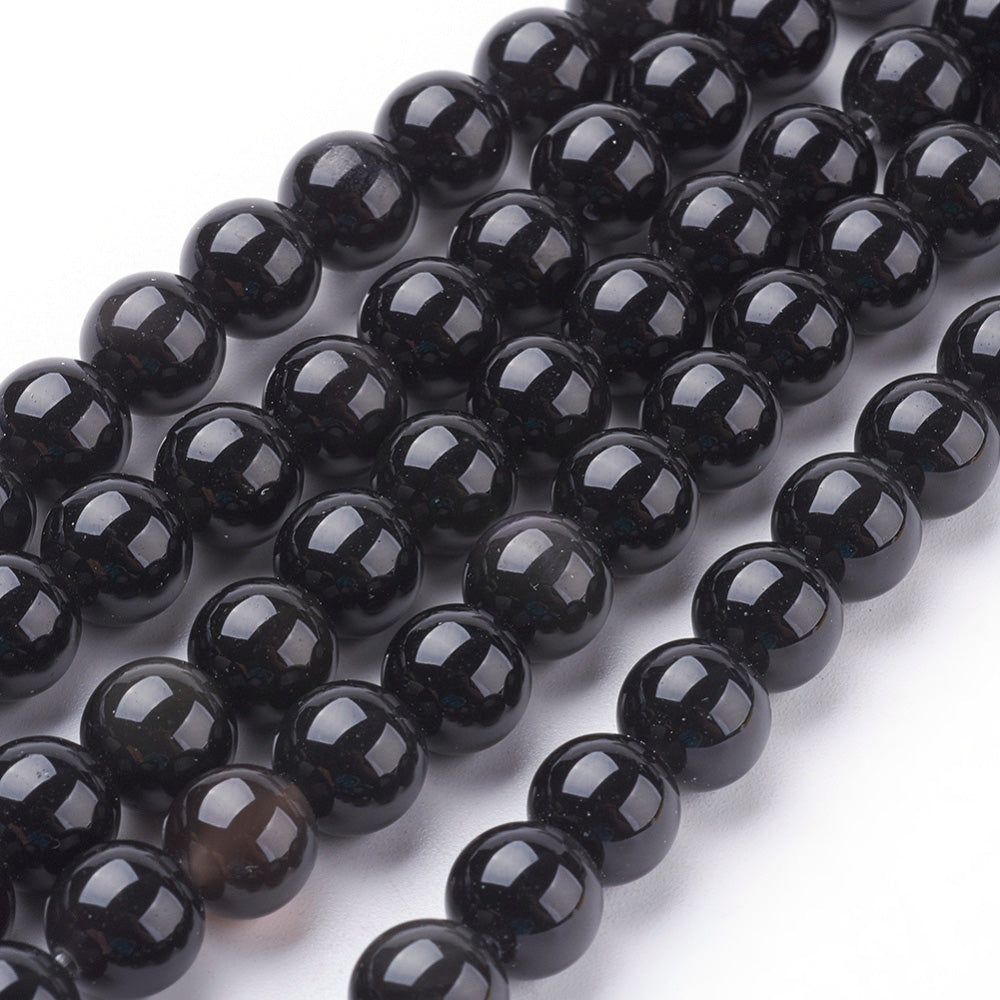 Black Obsidian Beads, Black Color. Semi-precious Gemstone Beads for DIY Jewelry Making.   Size: 10mm Diameter, Hole: 1mm approx. 35-37pcs/strand, 15 Inches Long.  Material: Genuine Grade "AA" Obsidian Stone Beads, Black Color. Shinny, Polished Finish. 