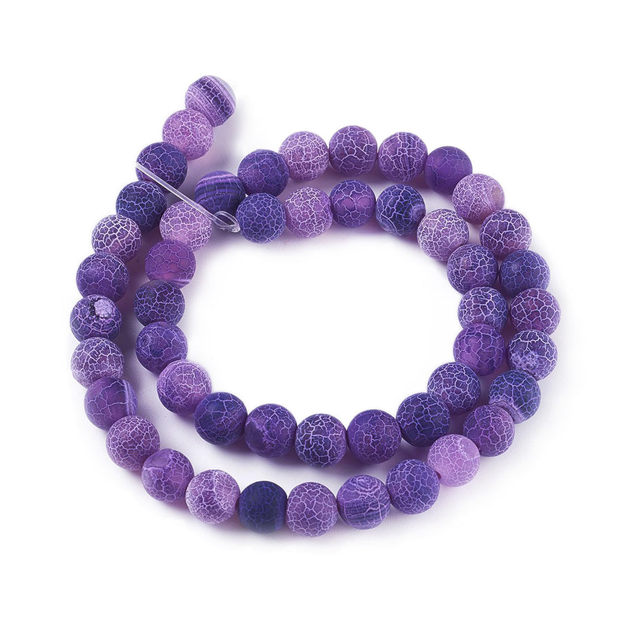 Crackle Agate Beads, Dyed, Round, Purple Color. Matte Semi-Precious Gemstone Beads for Jewelry Making. Great for Stretch Bracelets and Necklaces.  Size: 8mm Diameter, Hole: 1mm; approx. 46pcs/strand, 14.5" Inches Long.  Material: Natural & Dyed Crackle Agate, Frosted Purple Color with White Crackle Pattern. The Crackle Appearance is Created by Heating the Stone to Extreme Temperatures. Unpolished, Matte Finish.