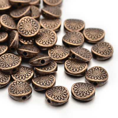 Flat Round Spacer Beads with design, Red Copper Colored Beads for Jewelry Making.  Size: 8.5mm Diameter, 3.5mm Thick, Hole: 1.5mm, Quantity: 10pcs/bag.  Material: Alloy (Lead & Nickel Free) Beads. Red Copper Color.