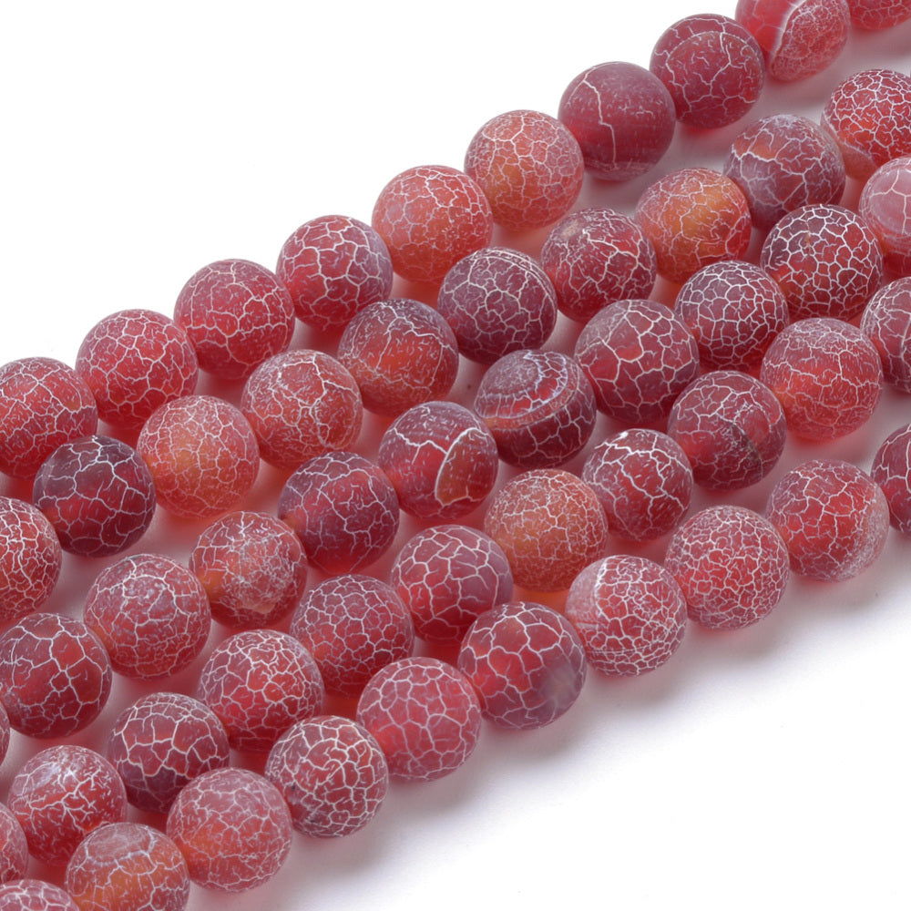 Natural Crackle Agate Beads, Dyed, Round, Red Color. Matte Semi-Precious Gemstone Beads for Jewelry Making. Great for Stretch Bracelets and Necklaces.  Size: 6mm Diameter, Hole: 1mm; approx. 61pcs/strand, 14.5" Inches Long.  Material: Natural & Dyed Crackle Agate, Frosted Red Color with White Crackle Pattern. The Crackle Appearance is Created by Heating the Stone to Extreme Temperatures. Unpolished, Matte Finish.