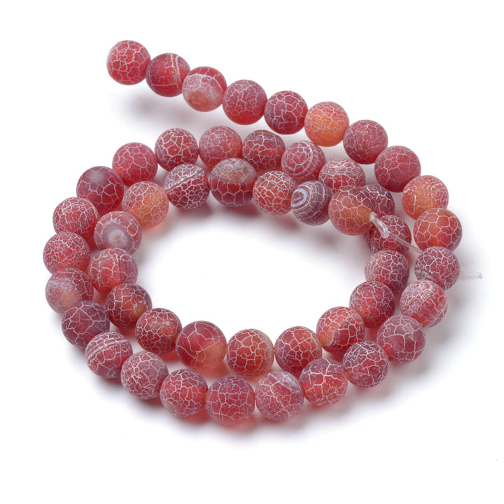 Natural Crackle Agate Beads, Dyed, Round, Red Color. Matte Semi-Precious Gemstone Beads for Jewelry Making. Great for Stretch Bracelets and Necklaces.  Size: 6mm Diameter, Hole: 1mm; approx. 61pcs/strand, 14.5" Inches Long.  Material: Natural & Dyed Crackle Agate, Frosted Red Color with White Crackle Pattern. The Crackle Appearance is Created by Heating the Stone to Extreme Temperatures. Unpolished, Matte Finish.