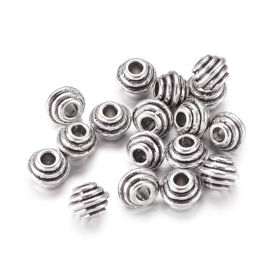 Spiral Design Spacer Beads, Rondelle, Antique Silver Color. Trendy Spacers for DIY Jewelry Making. High Quality, Classy, Non-Tarnish Spacers for Beading Projects.  Size: 5mm Length, 6.5mm Width, Hole: 2.5mm, approx. 25pcs/bag. 