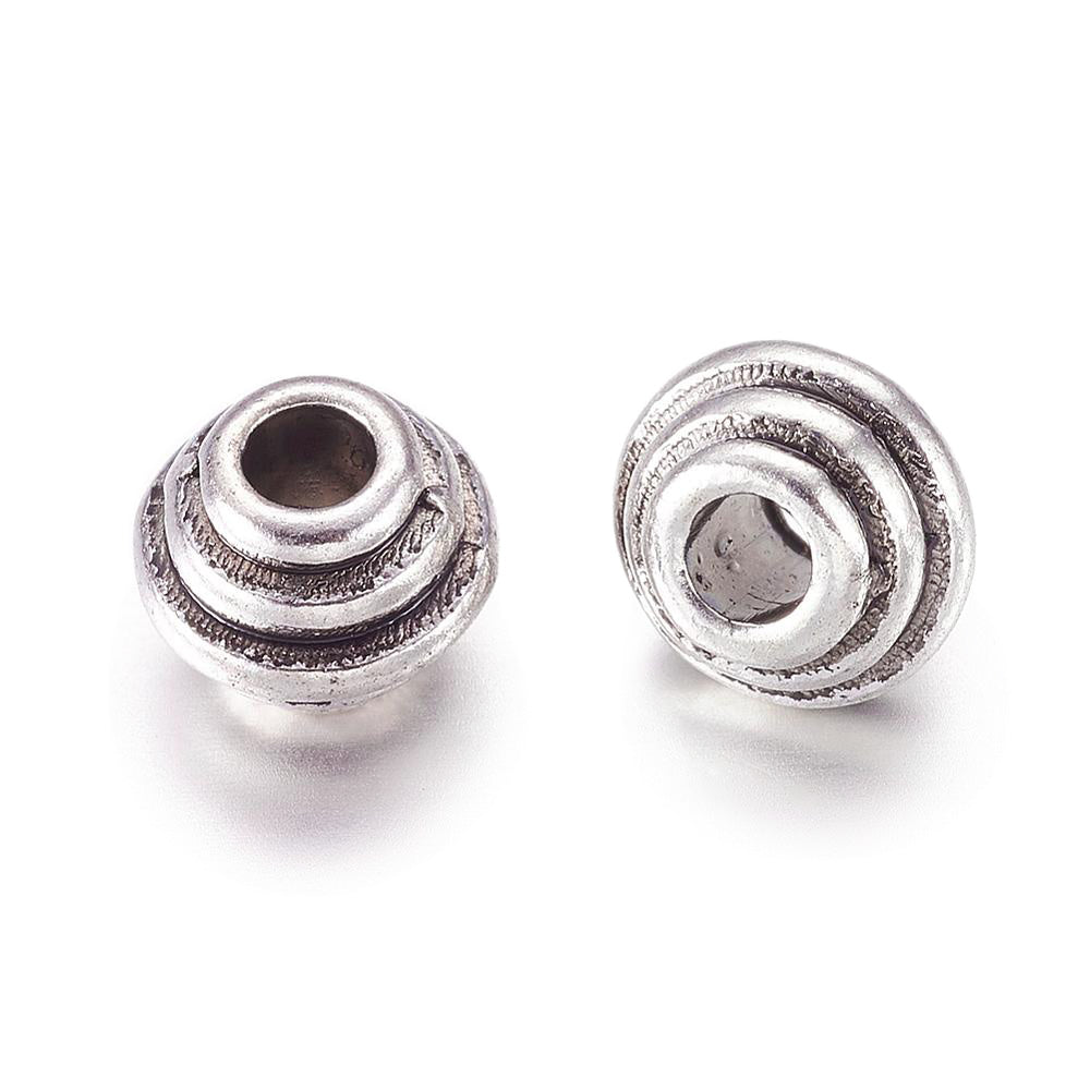 Spiral Design Spacer Beads, Rondelle, Antique Silver Color. Trendy Spacers for DIY Jewelry Making. High Quality, Classy, Non-Tarnish Spacers for Beading Projects.  Size: 5mm Length, 6.5mm Width, Hole: 2.5mm, approx. 25pcs/bag. 