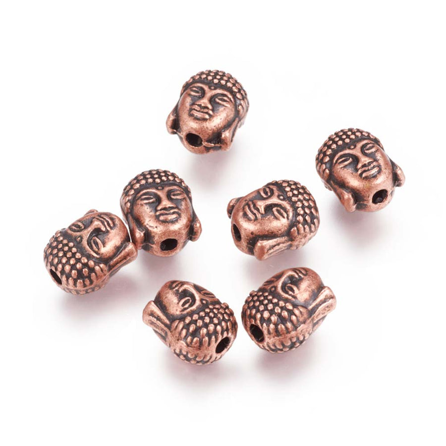 Tibetan Buddha Spacer Beads, Antique Copper Red Color. Buddha Head Spacers for DIY Jewelry Making Projects. High Quality, Non-Tarnish Focal Beads for Beading Projects. Antique Red Copper Tibetan Style Alloy Buddha Head Spacer Beads. Shinny Finish. 100% Lead and Nickel Free Spacers.