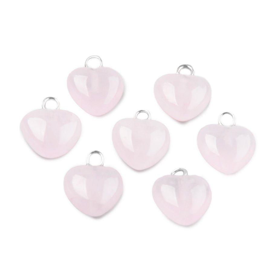 Rose Quartz Heart Charms, Pale Pink Color with Platinum Brass Findings. Semi-precious Gemstone Pendant for DIY Jewelry Making.  Size: 13-14mm Length, 10-10.5mm Wide, 5mm Thick, Hole: 1.8mm, 1pcs/package.   Material: Genuine Natural Rose Quartz Stone Pendant, Platinum Toned Brass Findings. Heart Shaped Stone Pendants. Polished Finish. 