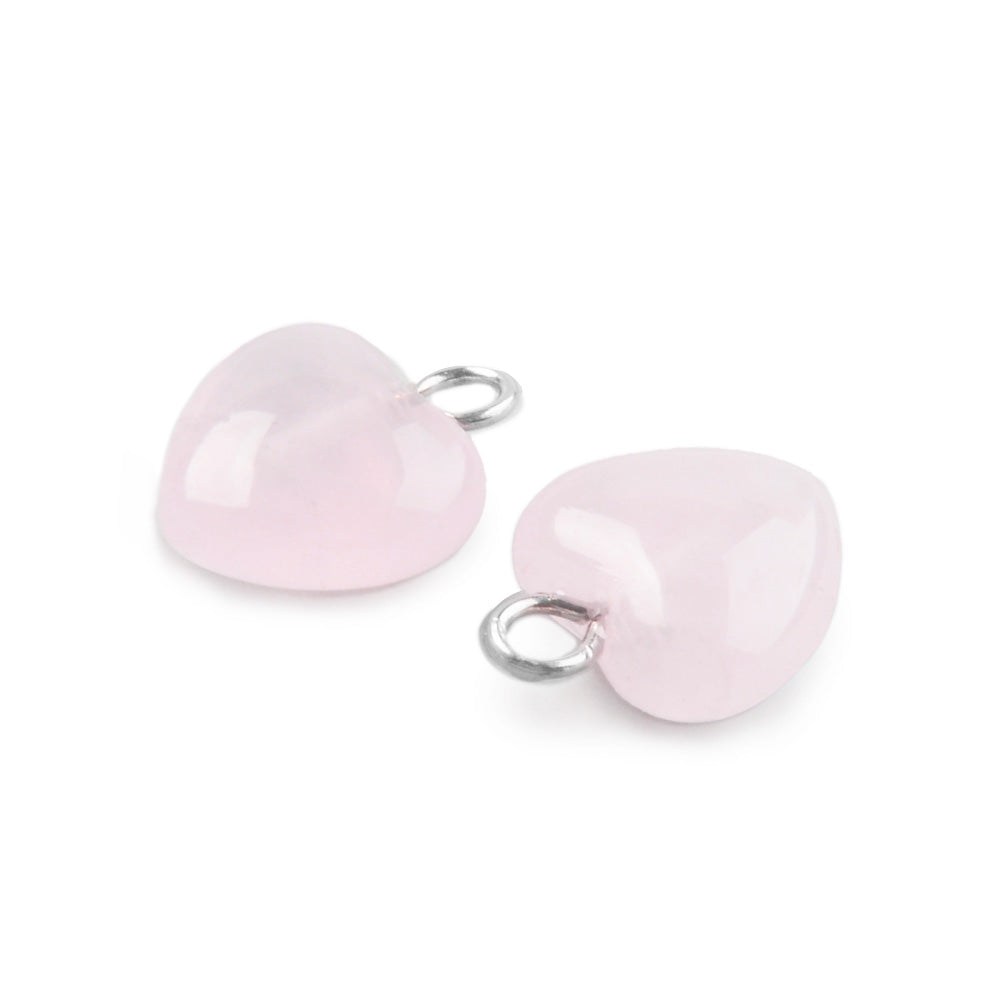 Rose Quartz Heart Charms, Pale Pink Color with Platinum Brass Findings. Semi-precious Gemstone Pendant for DIY Jewelry Making.  Size: 13-14mm Length, 10-10.5mm Wide, 5mm Thick, Hole: 1.8mm, 1pcs/package.   Material: Genuine Natural Rose Quartz Stone Pendant, Platinum Toned Brass Findings. Heart Shaped Stone Pendants. Polished Finish. 