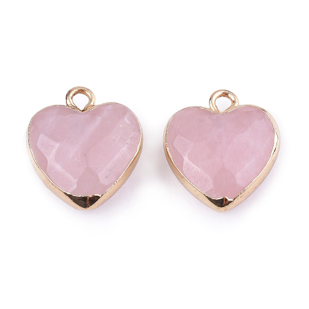 Rose Quartz Heart Charms, Pale Pink Color with Gold Plated Findings. Semi-precious Gemstone Pendant for DIY Jewelry Making.  Size: 16-17mm Length, 14-15mm Wide, 6-7mm Thick, Hole: 1.8mm, 1pcs/package.   Material: Genuine Natural Rose Quartz Stone Pendant, Gold Toned Findings. Heart Shaped Stone Pendants. Polished Finish. 