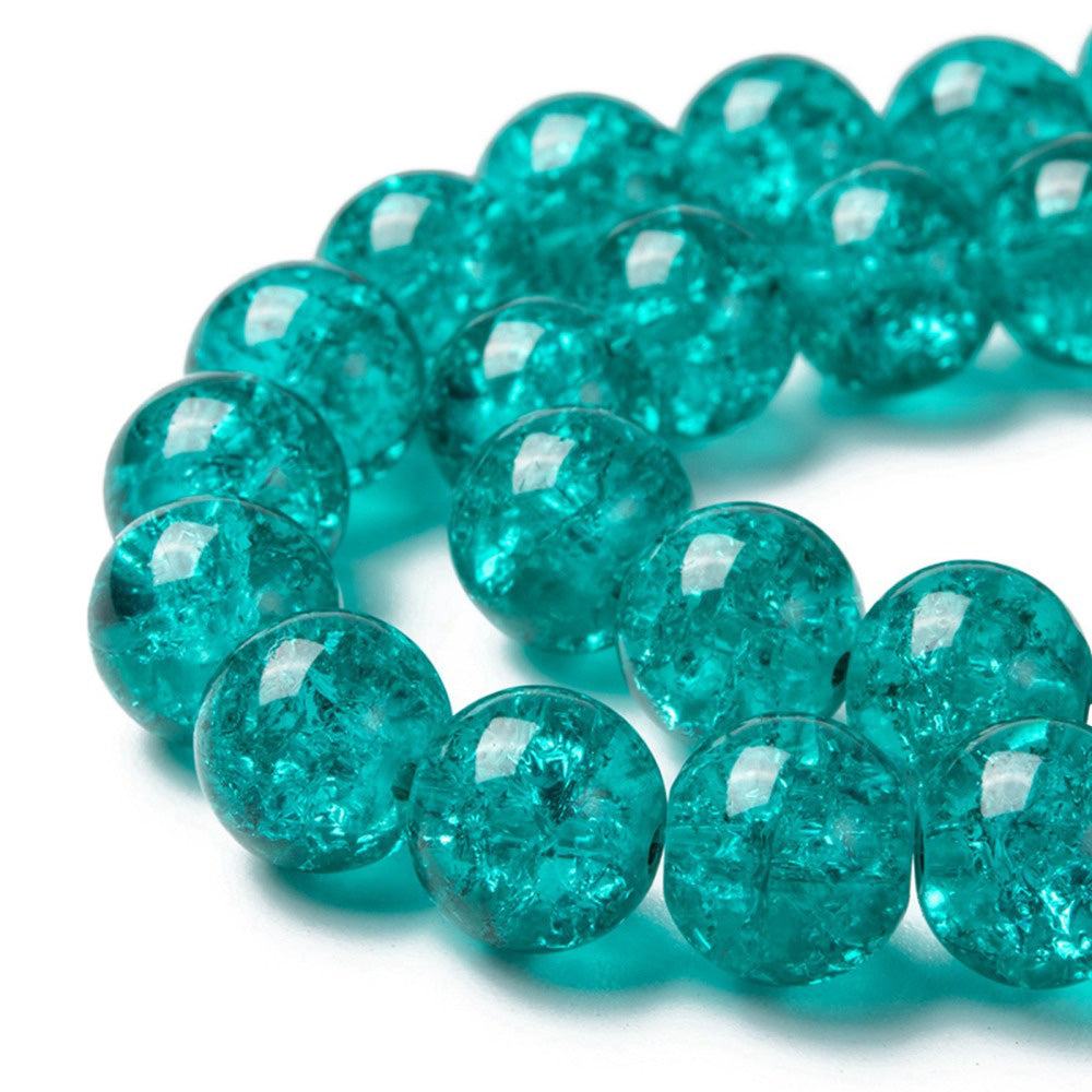 Popular Crackle Glass Beads, Round, Teal green Color. Glass Bead Strands for DIY Jewelry Making. Affordable, Colorful Crackle Beads.   Size: 4mm Diameter Hole: 1.1mm; approx. 198pcs/strand, 31" Inches Long  Material: The Beads are Made from Glass. Crackle Glass Beads, Teal Green Colored Beads with Clear Markings.  Polished, Shinny Finish.  Wide Application: Glass Beads are Suitable
