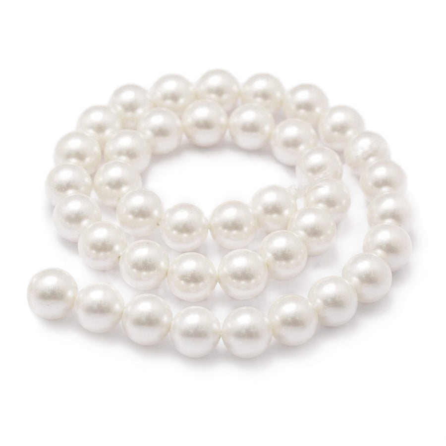 Shell Pearl Beads, Round, Floral White Color. High Quality Pearl Beads for Jewelry Making.  Size: 6mm Diameter, Hole: 1mm; approx. 60pcs/strand, 15 inches long.  Material: Premium Grade Shell Pearl Beads. Round, Floral White Color Loose Pearl Beads. Polished, Shinny Finish.