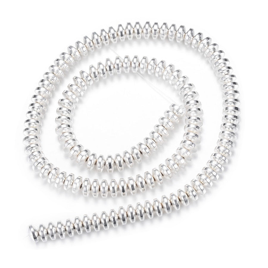 Electroplated Non-Magnetic Synthetic Hematite Beads, Silver Color. Semi-Precious Stone Spacer Beads for Jewelry Making.   Size: 4mm Wide, 2mm Thick, Hole: 1mm, approx. 175pcs/strand, 15.5" Inches Long.  Material: Non-Magnetic Synthetic Hematite Beads. Silver Color Plated. Rondelle Shape. Polished, Shinny Metallic Lustrous Finish.
