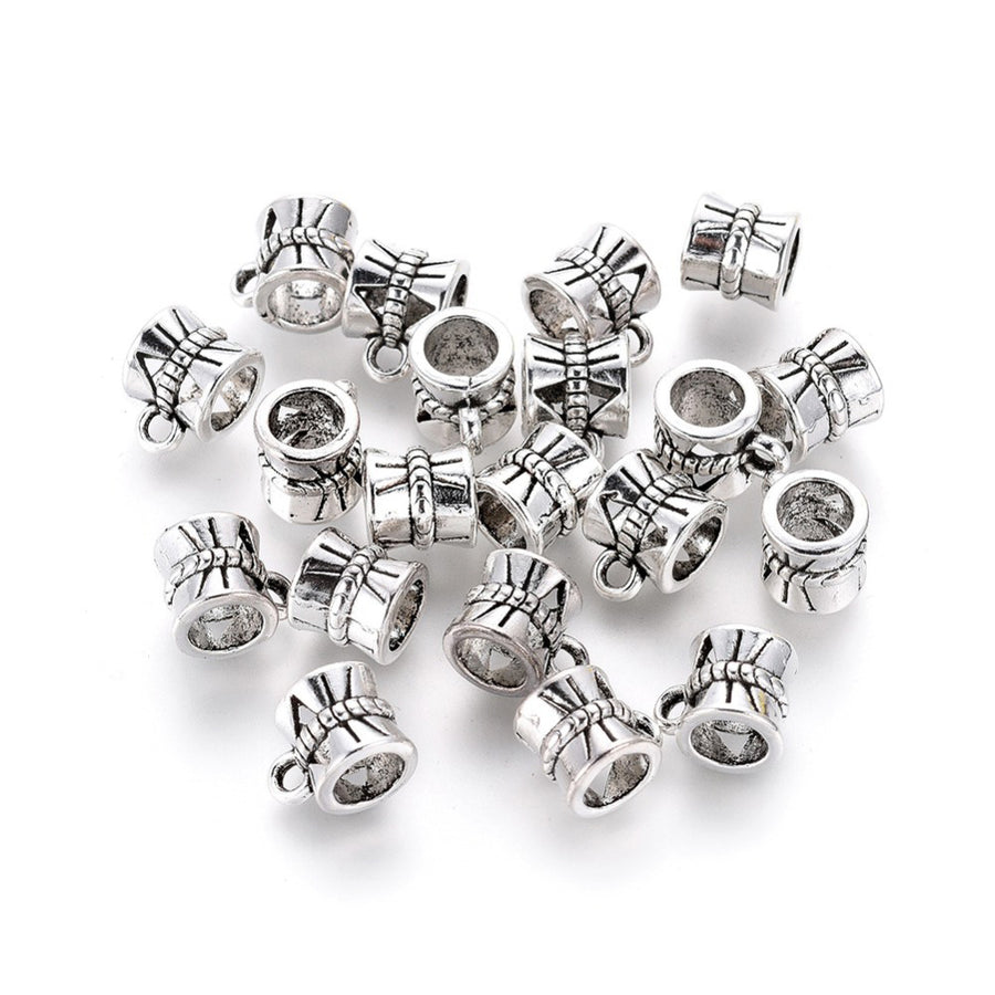 Tibetan Bail Tube Beads, Antique Silver Colored Tube Bails for Jewelry Making.  Size: approx. 7mm Diameter, 9mm Length, Hole: 2mm, Quantity: 6pcs/bag.  Material: Alloy (Lead and Nickel Free) Connectors, Bail Beads. Antique Silver Color. Shinny Finish.