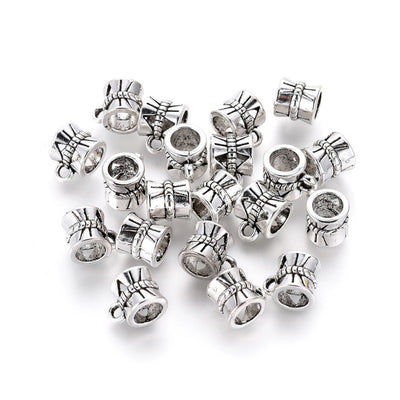Tibetan Bail Tube Beads, Antique Silver Colored Tube Bails for Jewelry Making.  Size: approx. 7mm Diameter, 9mm Length, Hole: 2mm, Quantity: 6pcs/bag.  Material: Alloy (Lead and Nickel Free) Connectors, Bail Beads. Antique Silver Color. Shinny Finish.