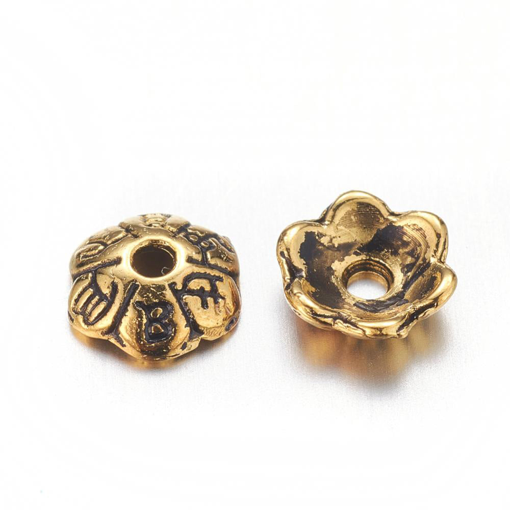 Six Petal Alloy Flower Spacer Beads. Flower Shaped Bead Caps, Gold Color. Flower Spacers for DIY Jewelry Making Projects.   Size: 6mm Diameter, 2mm Thick, Hole: 1mm, approx. 25pcs/package  Material: Alloy Flower Bead Caps. Shinny Antique Gold Color. Lead and Nickel Free.