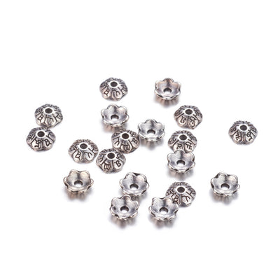 Six Petal Alloy Flower Spacer Beads. Flower Shaped Bead Caps, Silver Color. Flower Spacers for DIY Jewelry Making Projects.   Size: 6mm Diameter, 2mm Thick, Hole: 1mm, approx. 25pcs/package.