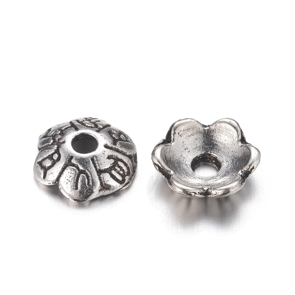 Six Petal Alloy Flower Spacer Beads. Flower Shaped Bead Caps, Silver Color. Flower Spacers for DIY Jewelry Making Projects.   Size: 6mm Diameter, 2mm Thick, Hole: 1mm, approx. 25pcs/package.