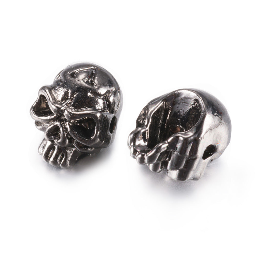 Tibetan Skull Spacer Beads, Gunmetal Color. Skull Shaped Alloy Spacers for DIY Jewelry Making Projects. High Quality Gunmetal Spacers; Perfect for Men's Bracelet Designs. Gunmetal Tibetan Alloy Spacers. Gunmetal Color Plated Skull Shaped Spacer Beads. Polished, Shinny Finish. Lead and Nickel Free.