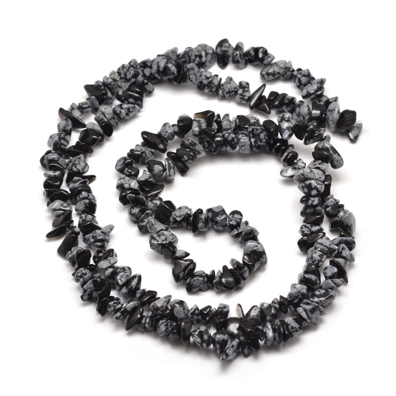 Snowflake Obsidian Chip Bead Strands, Chips, Black Color Chips. Semi-Precious Stone Chip Beads for Jewelry Making. Affordable High Quality Beads for Jewelry Making.  Size: approx. 5-8mm Wide, 5-8mm Long, Hole: 1mm; approx. 31.5" inches long.  Material: Genuine Natural Snowflake Obsidian Chip Bead Strands. Black Colored Stone Chip Beads. Polished, Shinny Finish.