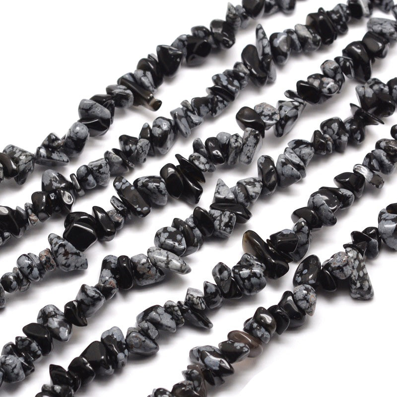 Snowflake Obsidian Chip Bead Strands, Chips, Black Color Chips. Semi-Precious Stone Chip Beads for Jewelry Making. Affordable High Quality Beads for Jewelry Making.  Size: approx. 5-8mm Wide, 5-8mm Long, Hole: 1mm; approx. 31.5" inches long.  Material: Genuine Natural Snowflake Obsidian Chip Bead Strands. Black Colored Stone Chip Beads. Polished, Shinny Finish.