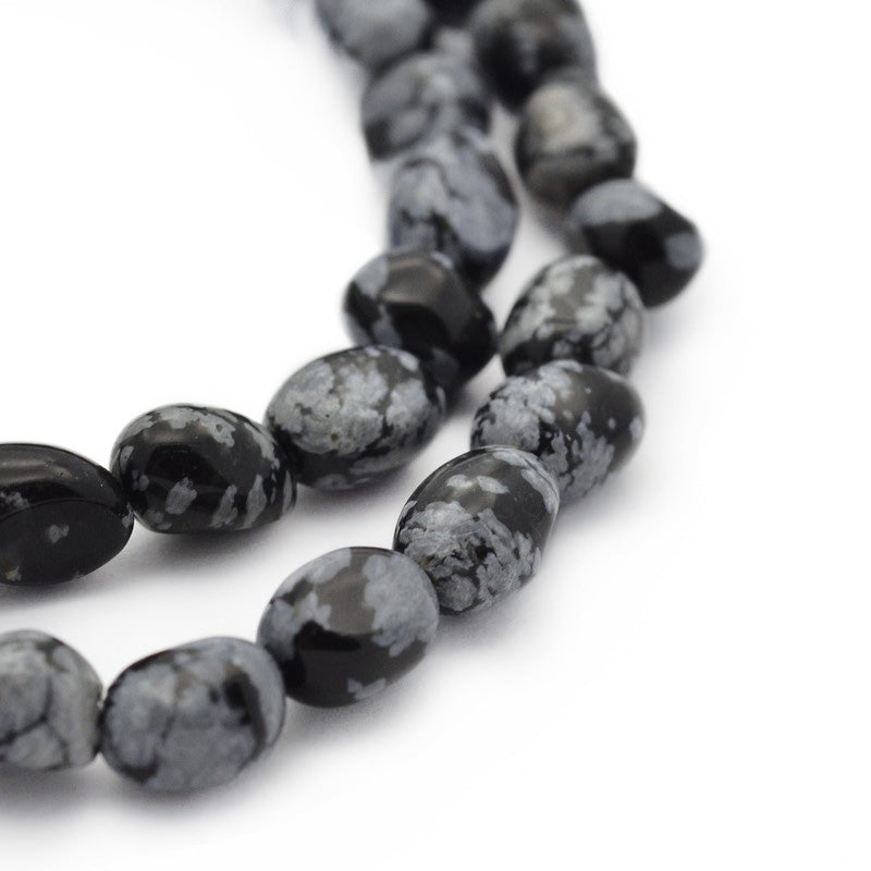 Snowflake Obsidian Nuggets, Chips, Black Color with Grey Markings Beads. Semi-precious Gemstone Beads for DIY Jewelry Making.    Size: 5-7mm Length, 5-7mm Width, Hole: 1mm, approx. 58pcs/strand, 14.5" Inches Long.  Material: Genuine Natural Snowflake Obsidian Stone Beads, Black Color, with Grey Markings. Polished Beads. Shinny Finish. 