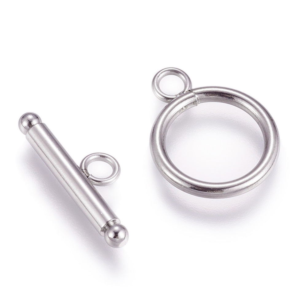 Tibetan Toggle Ring Clasp for DIY Jewelry Making. Antique Silver Color, Round Clasps.  Size: Ring: 21x16mm, Bar: 23x3mm, Hole: 2mm, 1 set/package.  Material: 304 Stainless Steel Toggle Clasps, Stainless Steel Silver Color Clasps. 