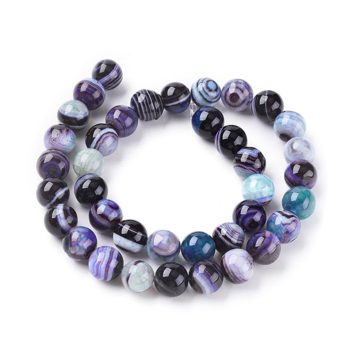 Prussian Blue Striped Agate Beads, Round, Dyed, Blue Banded Agate. Semi-Precious Gemstone Beads for Jewelry Making. Great for Stretch Bracelets and Necklaces.  Size: 10mm Diameter, Hole: 1.2mm; approx. 36pcs/strand, 14.5" Inches Long.  Material: Striped Banded Agate Beads Dyed Purple Blue Color. Polished, Shinny Finish.