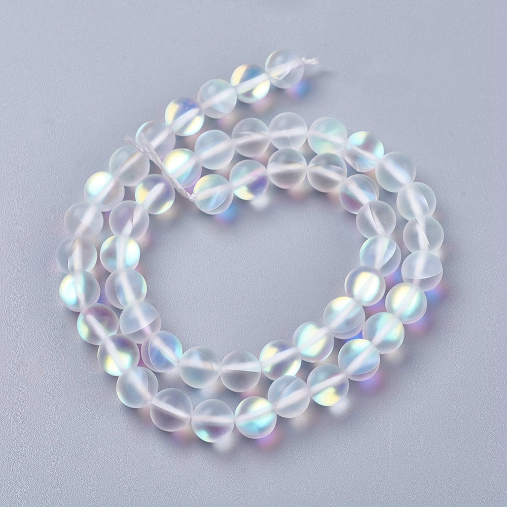 Frosted Synthetic Moonstone Beads, Round, Clear Color. Matte Holographic Beads for DIY Jewelry Making.  Size: 8mm in Diameter, Hole: 1mm, approx. 45-47pcs/strand, 14.5" Inches Long.  Material: Synthetic Frosted Moonstone Beads, Transparent Frosted Clear Color. Holographic Purple Beads. Frosted Matte Finish.