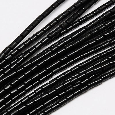 Synthethic Turquoise Beads, Column Shape Beads for Jewelry Making.   Size: 4mm Diameter, 6mm Length, Hole: 1mm; approx. 62-64pcs/strand, 15" Inches Long.  Material: Synthethic Turquoise Beads, Dyed, Black Color Column Beads.
