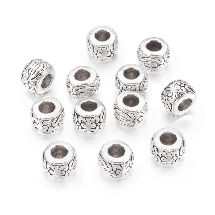 Tibetan Spacer Beads, Rondelle, Antique Silver Color. Trendy Spacers for DIY Jewelry Making. High Quality, Classy, Non-Tarnish Spacers for Beading Projects.  Size: 8mm Diameter, 5.5mm Thick, Hole: 3.5mm, approx. 10pcs/bag.   Material: Antique Silver Tibetan Style. 100% Lead, Cadmium & Nickel Free Spacers. www.beadlot.com