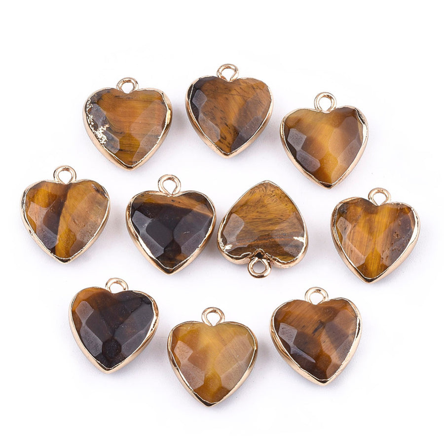 Faceted Tiger Eye Heart Charms, Goldenrod Brown Color with Gold Plated Findings. Semi-precious Gemstone Pendant for DIY Jewelry Making.  Size: 16-17mm Length, 14-15mm Wide, 6-7mm Thick, Hole: 1.8mm, 1pcs/package.   Material: Genuine Natural Tiger Eye Stone Pendant, Gold Toned Findings. Heart Shaped Stone Pendants. Faceted Polished Finish. 