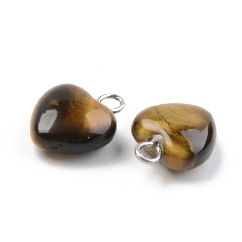 Tiger Eye Heart Charms, Yellow Brown Color with Platinum Brass Findings. Semi-precious Gemstone Pendant for DIY Jewelry Making.  Size: 13-14mm Length, 10-10.5mm Wide, 5mm Thick, Hole: 1.8mm, 1pcs/package.   Material: Genuine Natural Tiger Eye Stone Pendant, Platinum Toned Brass Findings. High Quality, Heart Shaped Stone Pendants. Shinny, Polished Finish. 
