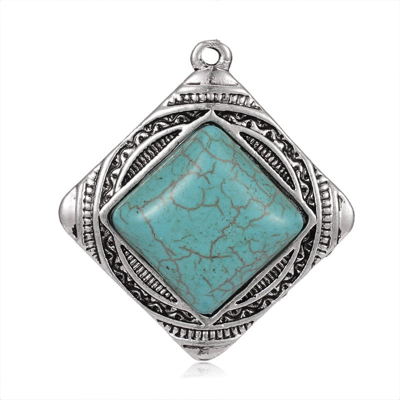 Antique Silver Plated Turquoise Gemstone Pendants, Turquoise Color. Semi-precious Gemstone Pendant for DIY Jewelry Making. Gorgeous Centre piece for Necklaces.   Size: 45mm Length, 41mm Wide, 8.5mm Thick, Hole: 2mm, 1pcs/package.   Material: Synthetic Turquoise Stone Pendant, Antique Silver Plated Alloy Pendant. High Quality, Rhombus Stone Pendants. Shinny, Polished Finish. 