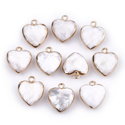 Faceted White Howlite Heart Charms, White Color with Gold Plated Findings. Semi-precious Gemstone Pendant for DIY Jewelry Making.  Size: 16-17mm Length, 14-15mm Wide, 6-7mm Thick, Hole: 1.8mm, 1pcs/package.   Material: Genuine Natural Howlite Stone Pendant, Gold Toned Findings. Heart Shaped Stone Pendants. Polished Finish. 