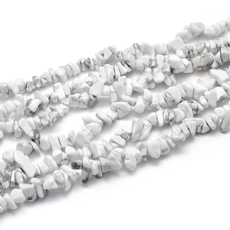 White Howlite Chip Beads, White color Semi-Precious Stone Chips.  Size: approx. 5~8mm wide, 5~8mm long, hole: 1mm; approx. 32 inches long.  Material: Genuine Natural Howlite Chip Beads. White Colored Chip Beads. Polished, Shinny Finish.