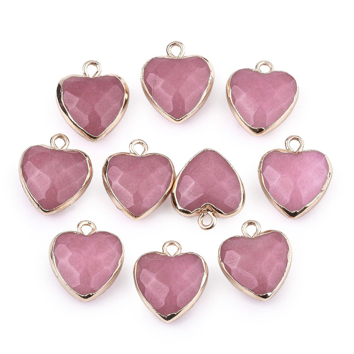 Faceted White Jade Heart Charms, Pale Flamingo Pink Pink Color with Gold Plated Findings. Semi-precious Gemstone Pendant for DIY Jewelry Making.  Size: 16-17mm Length, 14-15mm Wide, 6-7mm Thick, Hole: 1.8mm, 1pcs/package.   Material: Natural White Jade Stone Pendant, dyed Flamingo Pink Color. Gold Toned Findings. Heart Shaped Stone Pendants. Faceted, Polished Finish. 