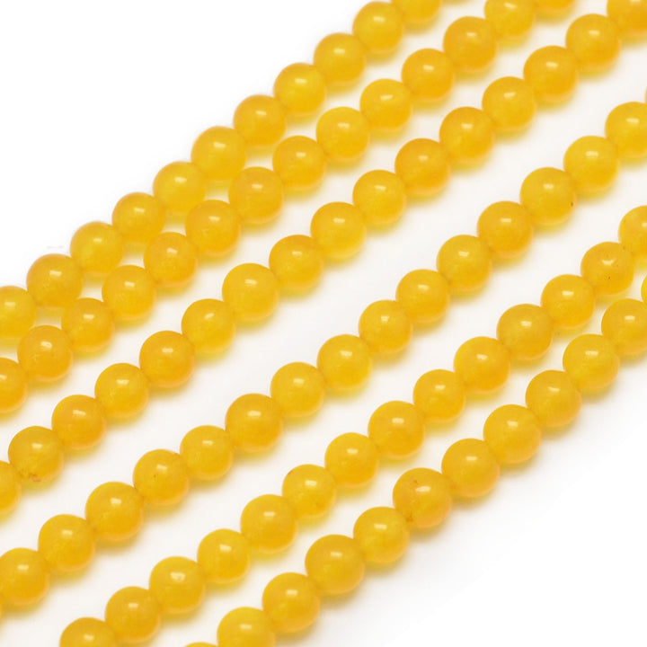 Yellow Jade Beads, Round, Golden Yellow Color. Semi-Precious Crystal Gemstone Beads for Jewelry Making. Great for Stretch Bracelets.  Size: 4mm in Diameter, Hole: 0.8mm; approx. 90pcs/strand, 14.5" Inches Long.  Material: Yellow Aventurine Imitation Beads. Malaysia Jade Beads, dyed Yellow Color. Polished, Shinny Finish.