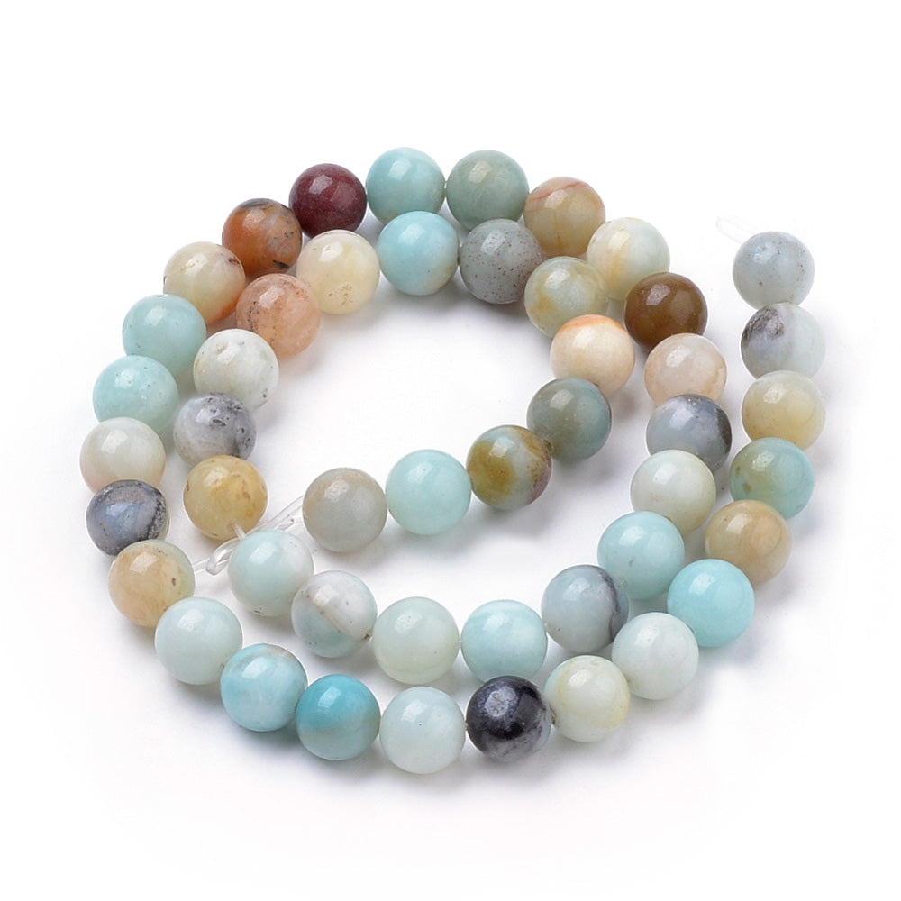 Natural Amazonite Beads, Round. Semi-Precious Amazonite Beads for DIY Jewelry Making.&nbsp;

Sizes:

4mm Diameter, Hole: 1mm, approx. 85-90pcs/strand, 15" inches long.

6mm Diameter, Hole: 1mm, approx. 58-60pcs/strand, 15" inches long.

8-8.5mm in diameter, hole: 1mm, approx. 44-48pcs/strand, 15" inches long.

10mm Diameter, Hole: 1mm, approx. 38-40pcs/strand, 15" inches long.

12mm Diameter, Hole: 1mm, approx. 32-34pcs/strand, 15" inches long.

Material: Genuine, Multi-Colored Amazonite Stone Beads. M
