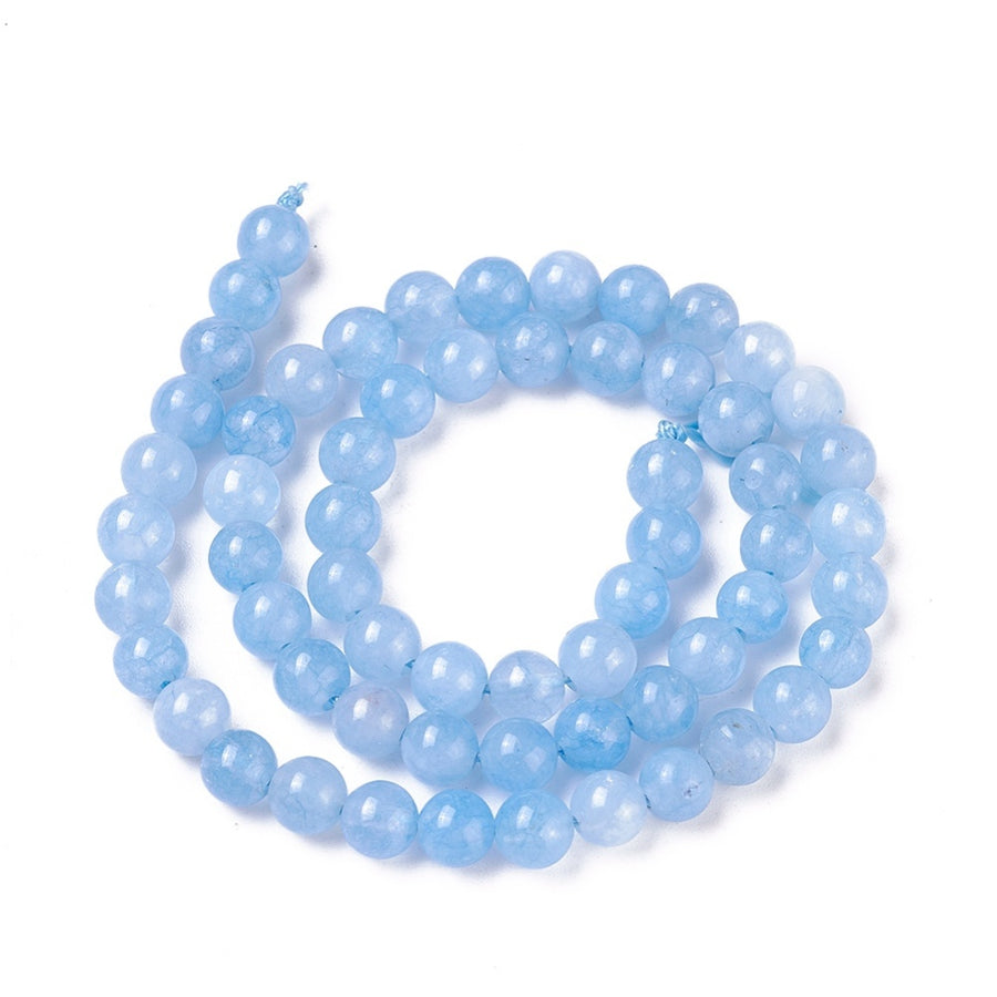 Stunning Aquamarine Natural Jade Beads, Round, Light Blue Color. Semi-Precious Crystal Gemstone Beads for Jewelry Making. Great for Stretch Bracelets.  Size: 6mm in Diameter, Hole: 1mm; approx. 60pcs/strand, 14.75" Inches Long.  Material: Imitation Aquamarine Beads made from Natural Jade dyed Blue Color. Polished, Shinny Finish. bead lot, beads and more. beadlotcanada beads. www.beadlot.com