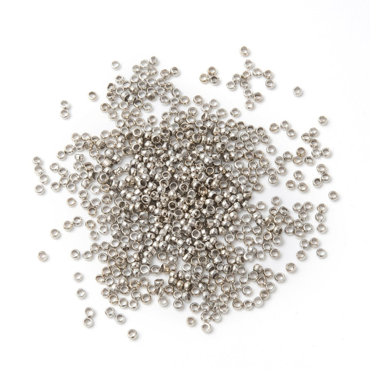 Platinum Silver Colored Brass Crimping Beads DIY Jewelry Making.  Size: 2x2mm approx. 250pcs/pkg  Material: Brass Rondelle Crimp Beads, Platinum Silver Color.