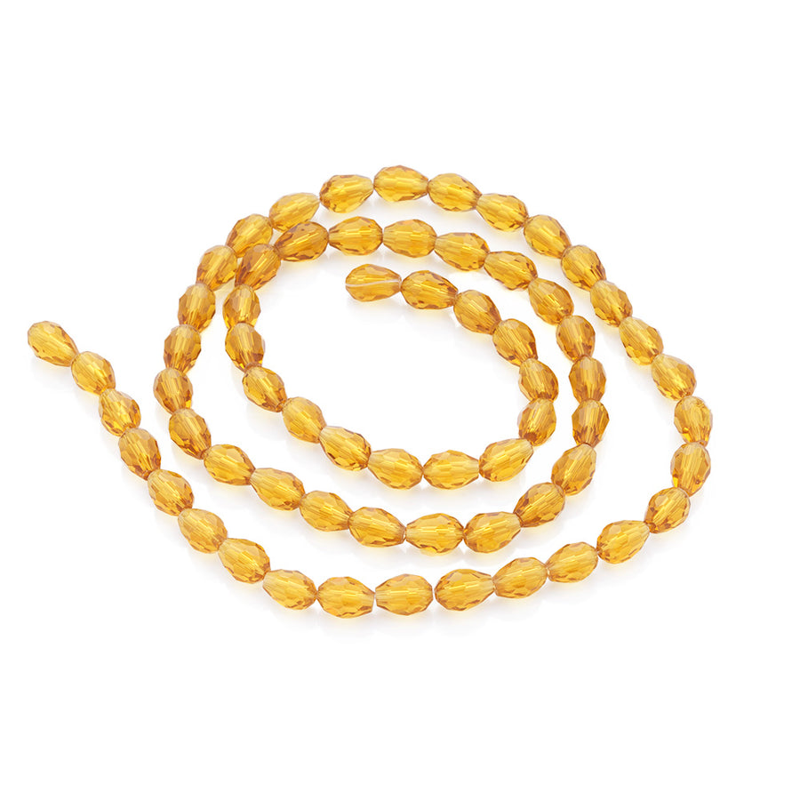 Tear Drop Crystal Glass Beads, Faceted, Golden Yellow Color, Glass Crystal Bead Strands. Shinny, Premium Quality Crystal Beads for Jewelry Making.  Size: 7mm Diameter, 5mm Thick, Hole: 1.5mm; approx. 68pcs/strand, 16" inches long.