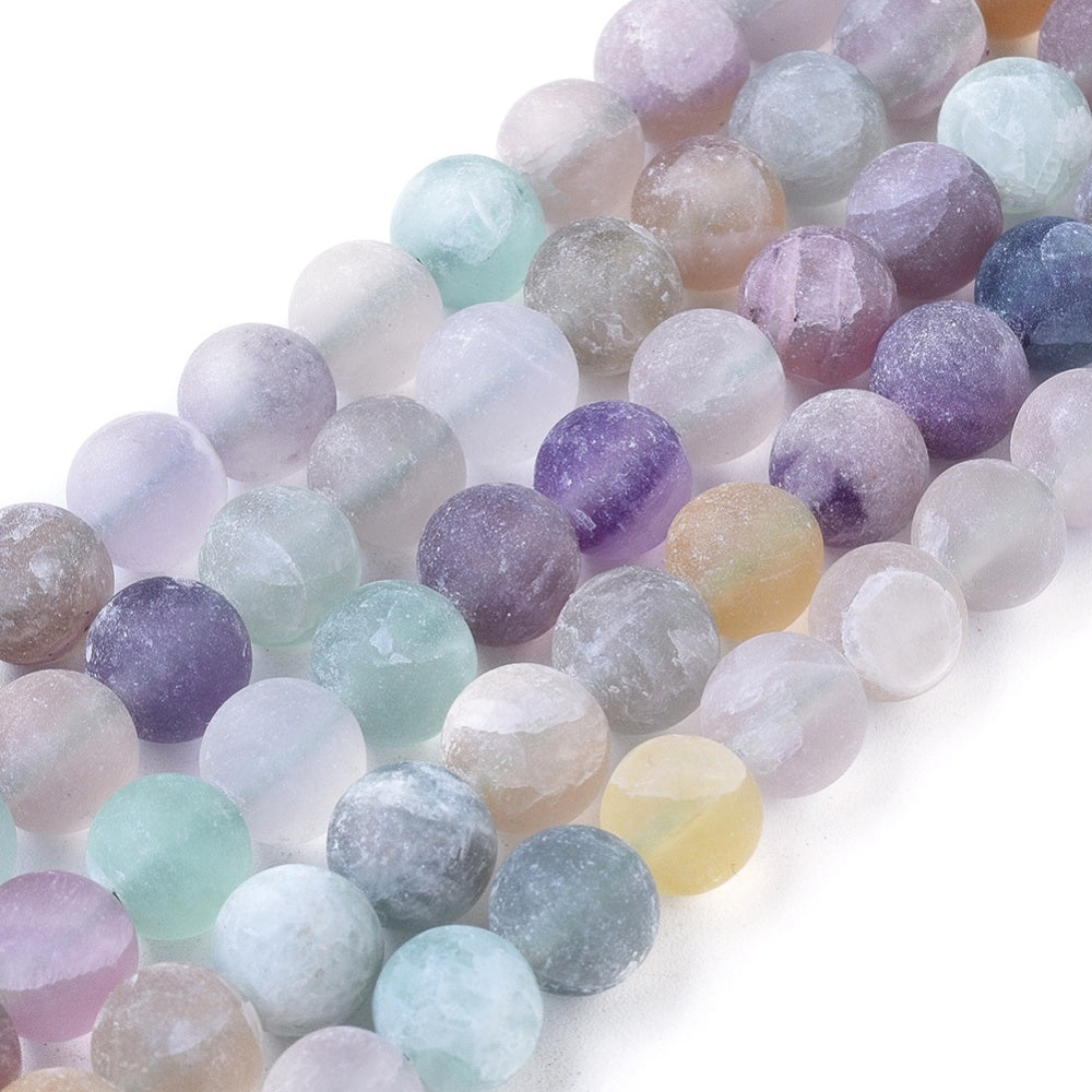 Frosted Natural Rainbow Fluorite Beads, Round, Matte Fluorite Gemstone Beads for DIY Jewelry Making. Semi-precious Fluorite Beads Contain Various Shades of Matte Green and some Matte Purple Beads with Specs of Grey and White.   Size: 8mm Diameter, Hole: 1.2mm; approx. 48pcs/strand, 15 inches long.   Material: Genuine Frosted Natural Rainbow Fluorite Bead Strand, Loose Stone Beads, High Quality Polished Stone Beads. Matte, Unpolished Finish. 