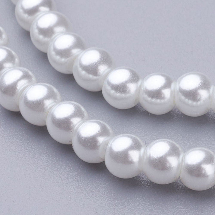 Glass Pearl Bead Strands, Round, White Color. Shinny Pearl Beads for Jewelry Making.  Size: 4mm in diameter, hole: 1mm; approx. 198pcs/strand, 30 inches long.  Material: The Beads are Made from Glass. Glass, Pearlized, Round, White Color Beads. Polished, Shinny Finish.
