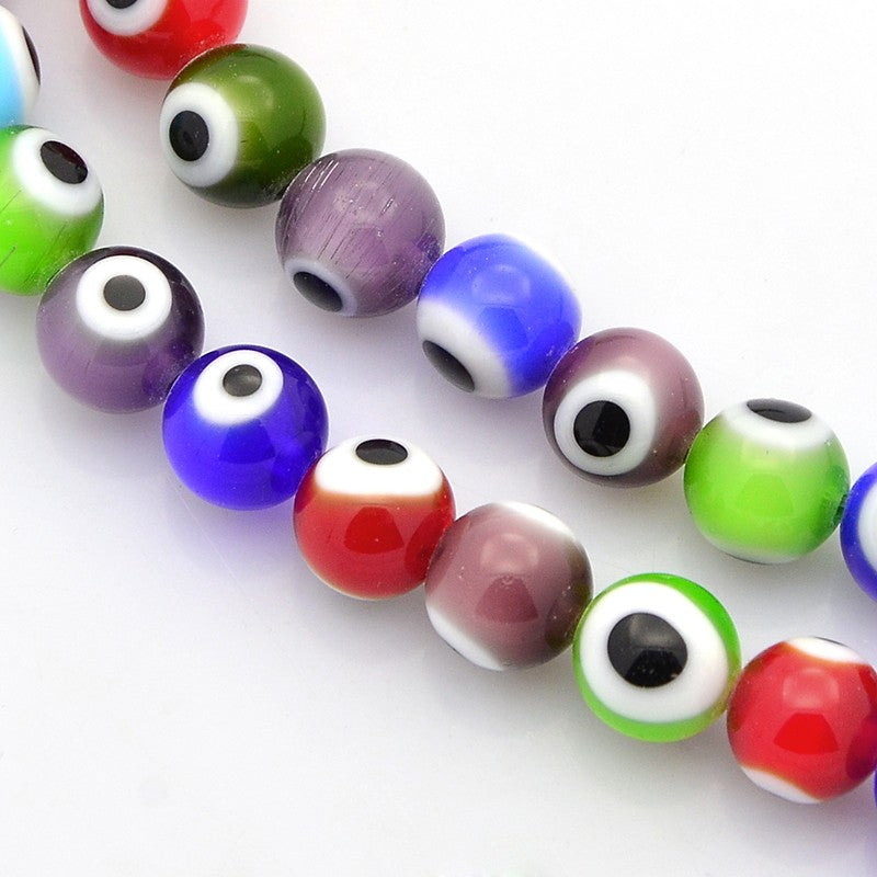 Glass Evil Eye Lampwork Beads, Spacer Beads, Round, Multi Color. Evil Eye Glass Beads for DIY Jewelry Making Projects. Evil Eye Spacer Beads. Perfect for Stretch Bracelets.  Size: 8mm Diameter, Hole: 1mm, approx. 50pcs/strand, 16" inches long.  Material: Handmade Evil Eye Lampwork Beads.  Round, Glass Spacer Beads. Mixed Color, Evil Eye Theme. Polished, Shinny Finish. 