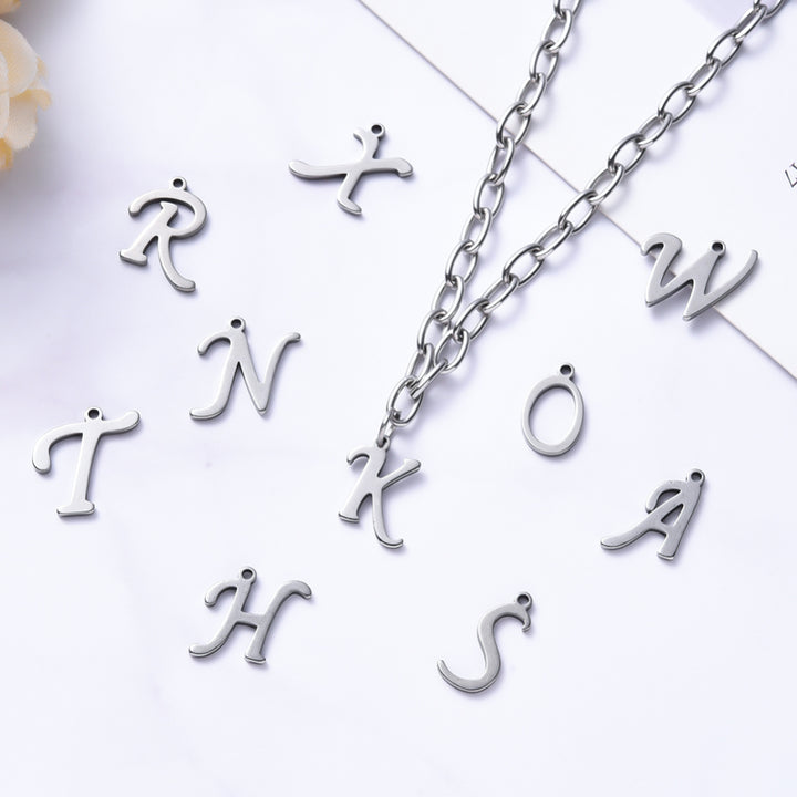 304 Stainless Steel Alphabet Charm Beads, Stainless Steel Color. Silver Colored Letter A-Z Charms for DIY Jewelry Making. Alphabet Charms for Bracelet and Necklace Making. Laser Cut 304 Stainless Steel Alphabet Charms. Silver Color. Shinny Finish. These A-Z Letter Charms are Suitable for Necklaces, Earrings, Anklets, Bracelets, and other Creative Projects. www.beadlot.com