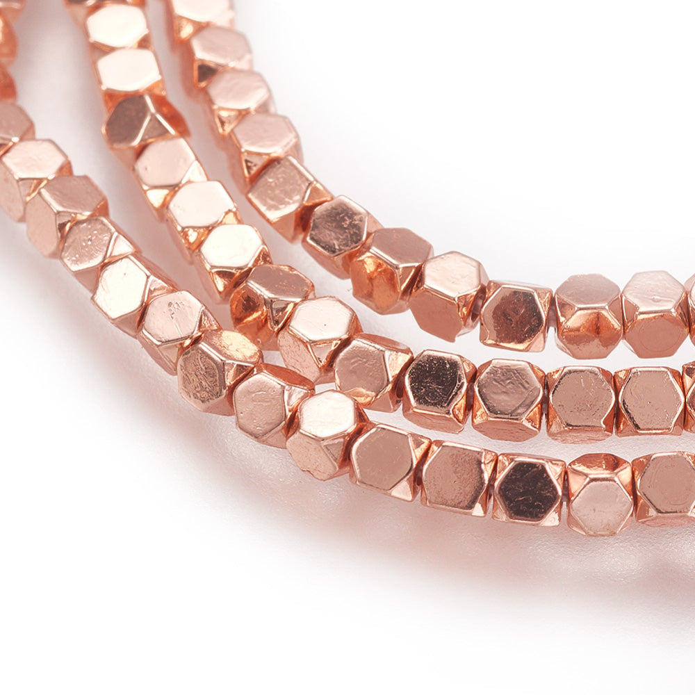 Stunning Rose Gold, Faceted, Square Hematite Spacer Beads, Electroplated Non-magnetic Synthetic Hematite Beads. Semi-Precious Stone Rose Gold Spacers for Jewelry Making.  Size: 2.5mm Length, 2mm Width, hole: 0.5mm; approx. 168-180pcs/strand, 15.7 inches.  Material: Faceted, Square Shaped, Non-Magnetic Synthetic Electroplated Rose Gold Hematite Loose Spacer Beads. Rose Gold Plated Spacers. Polished, Shinny Finish.   